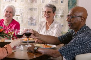 holly creek residents enjoying dinner