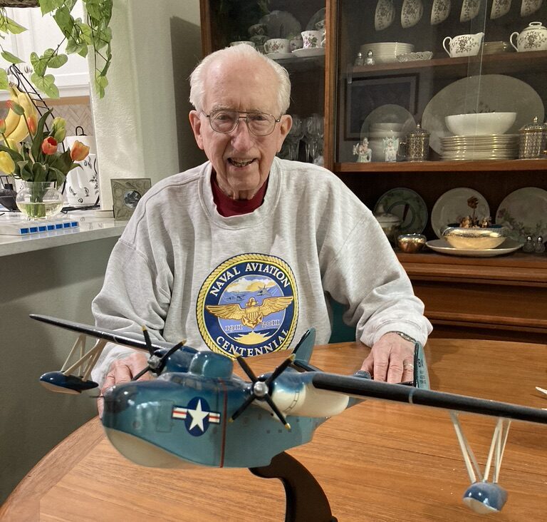 fd9a86b4 ba6c 451a b107 abb569c9a650 1 105 c e1625157249702 Detwiler with the first naval plane he served aboard – a PBM Mariner.