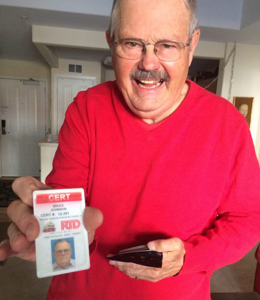 Johnson displays his emergency response training certification through RTD Johnson displays his emergency response training certification through RTD