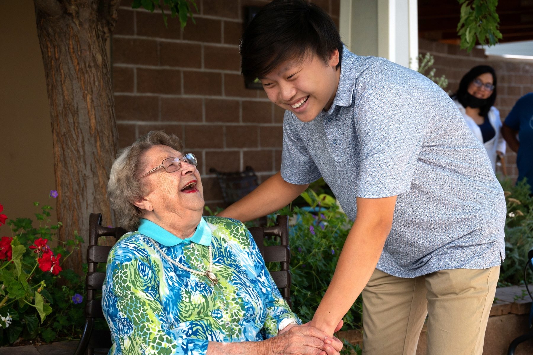 resident and visitor laughing landscape