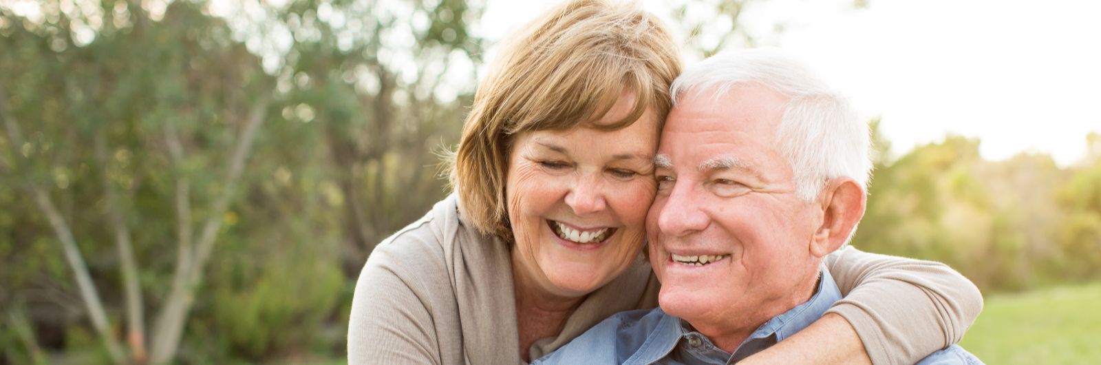older couple in park landscape (1)