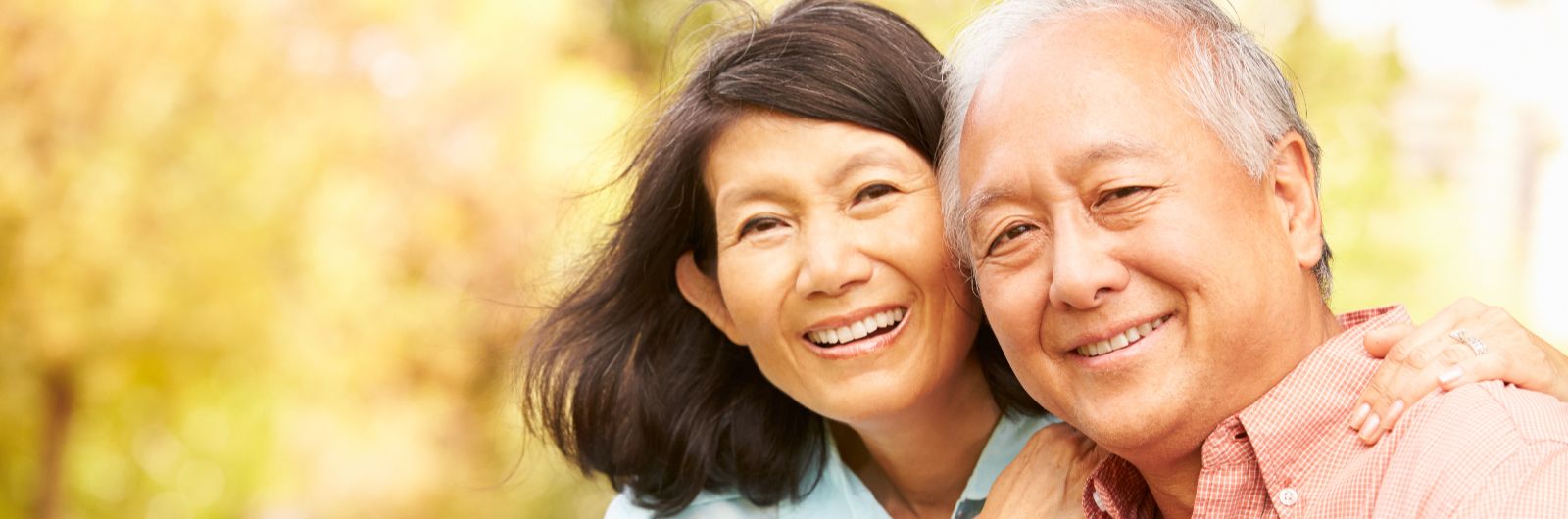 asian couple outside landscape