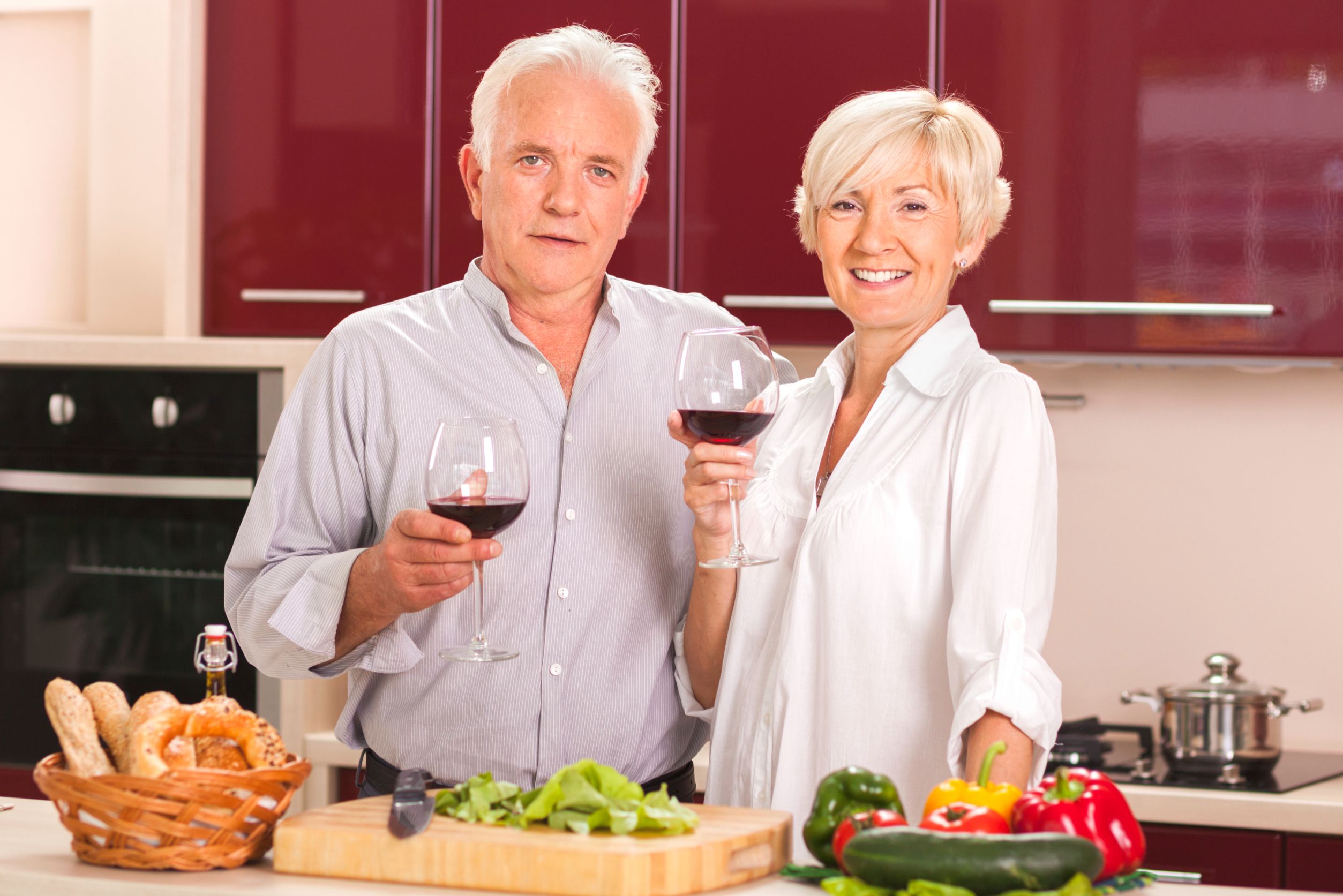 mullen residences at the highlands senior couple with wine landscape 1