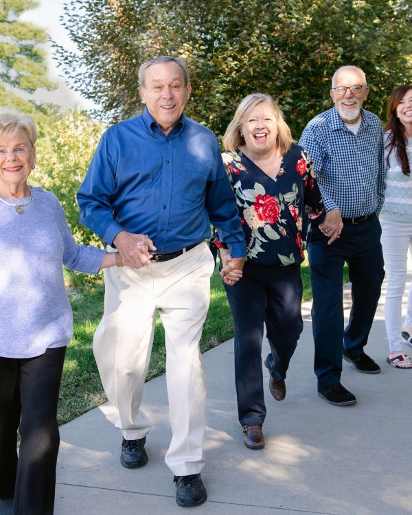 residents walking on sidewalk portrait residents walking on sidewalk portrait
